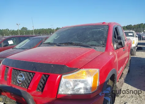 2012 Nissan Titan Pro-4X из США, поврежденный, VIN 1N6BA0ECXCN322271